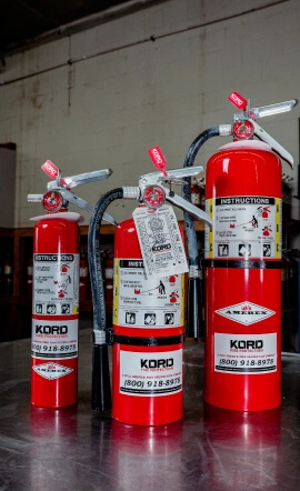 three fire extinguishers
