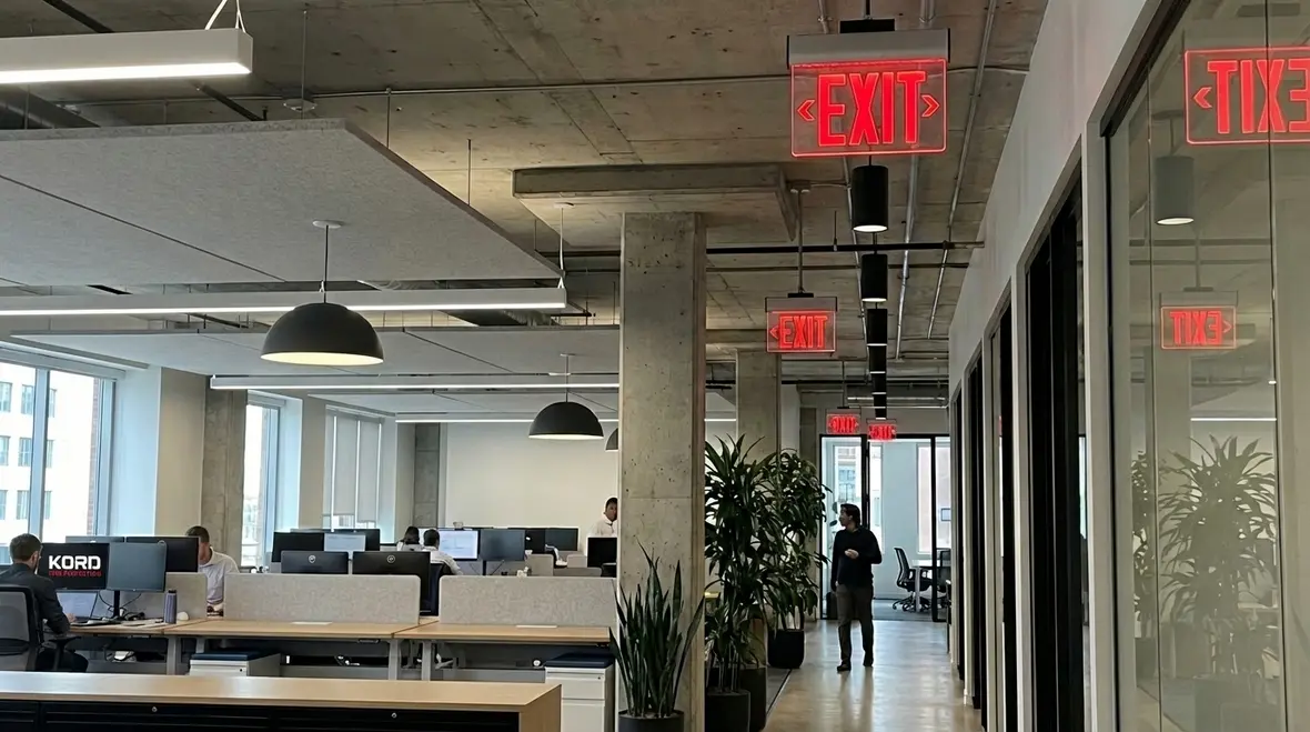 Exit sign placement in open plan offices