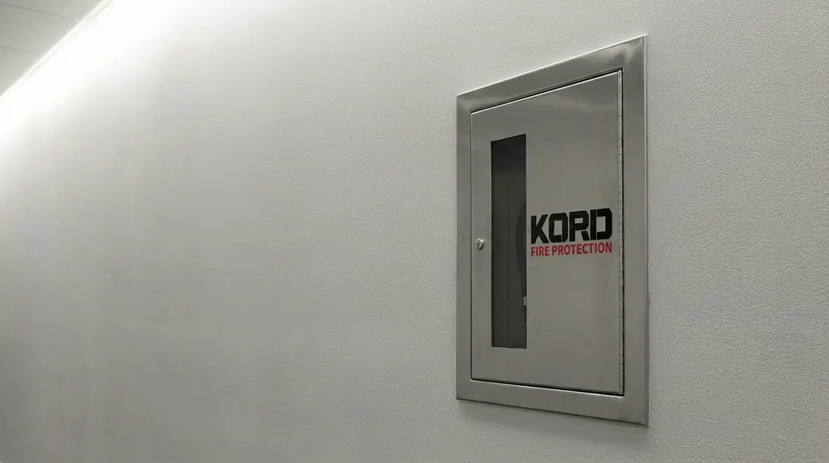 Side view showing difference between recessed and surface mounted fire extinguisher cabinets