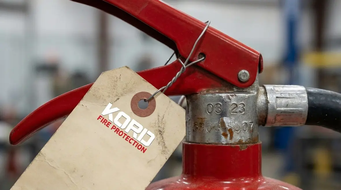 Close up of fire extinguisher cylinder neck markings