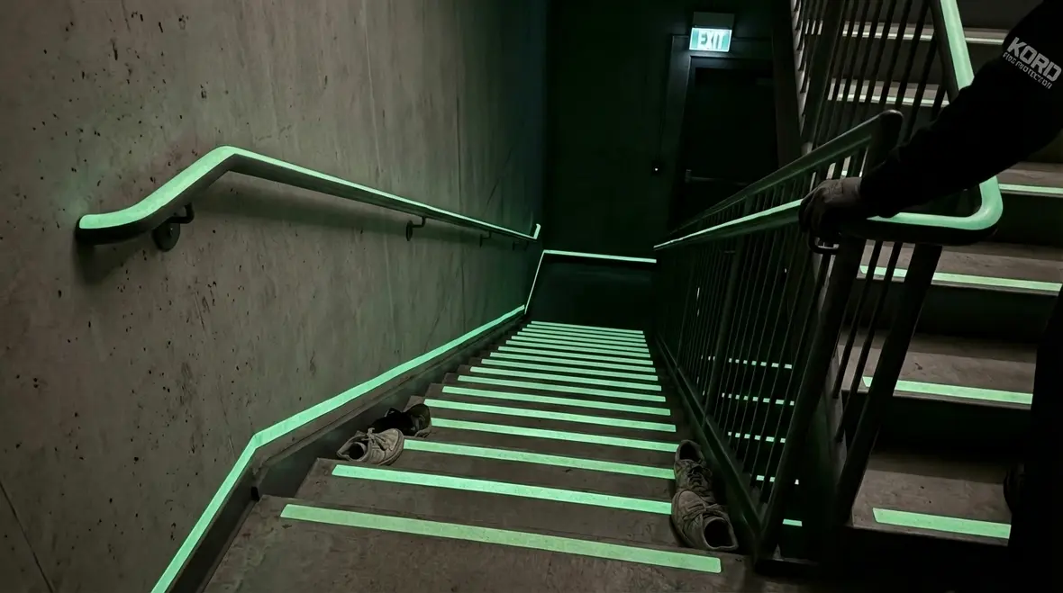 Photoluminescent egress marking requirements in a high rise stairwell