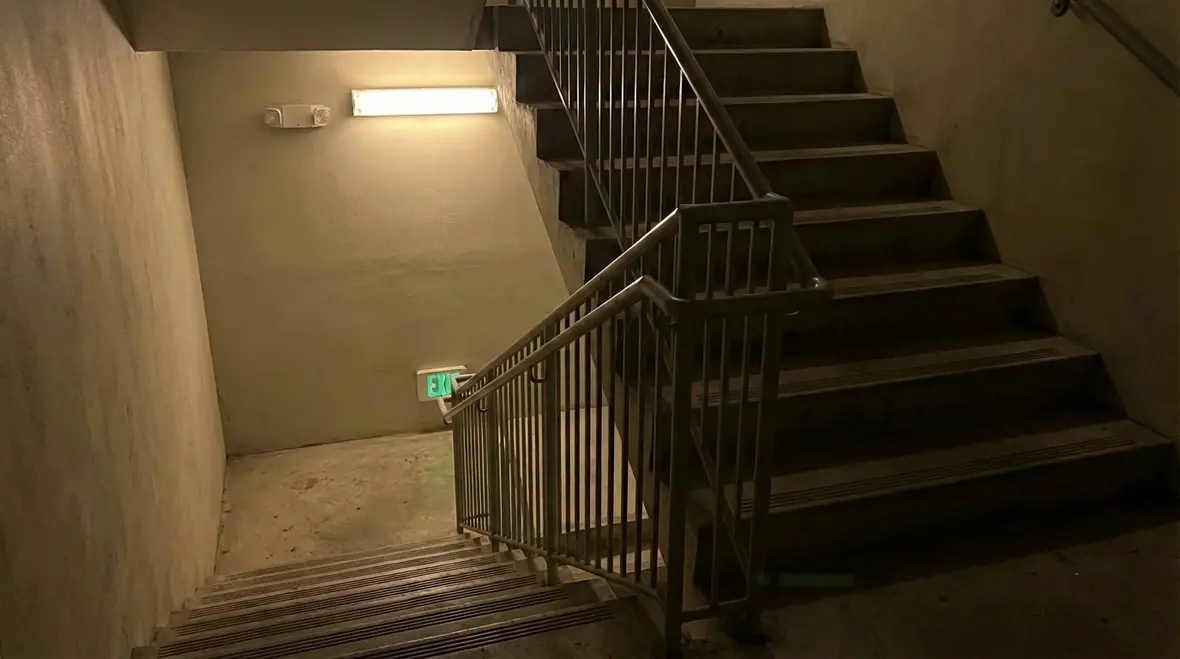 Stairwell emergency lighting placement in high rise building