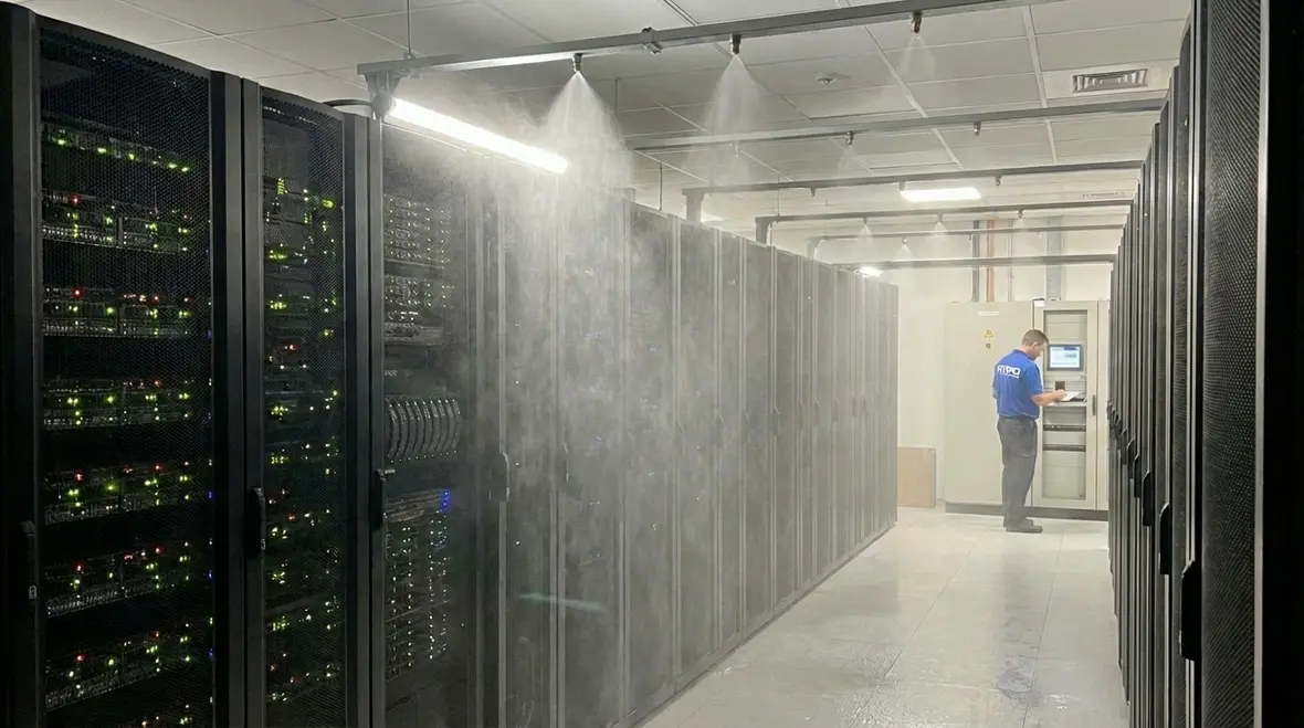 Water mist fire suppression system protecting critical equipment