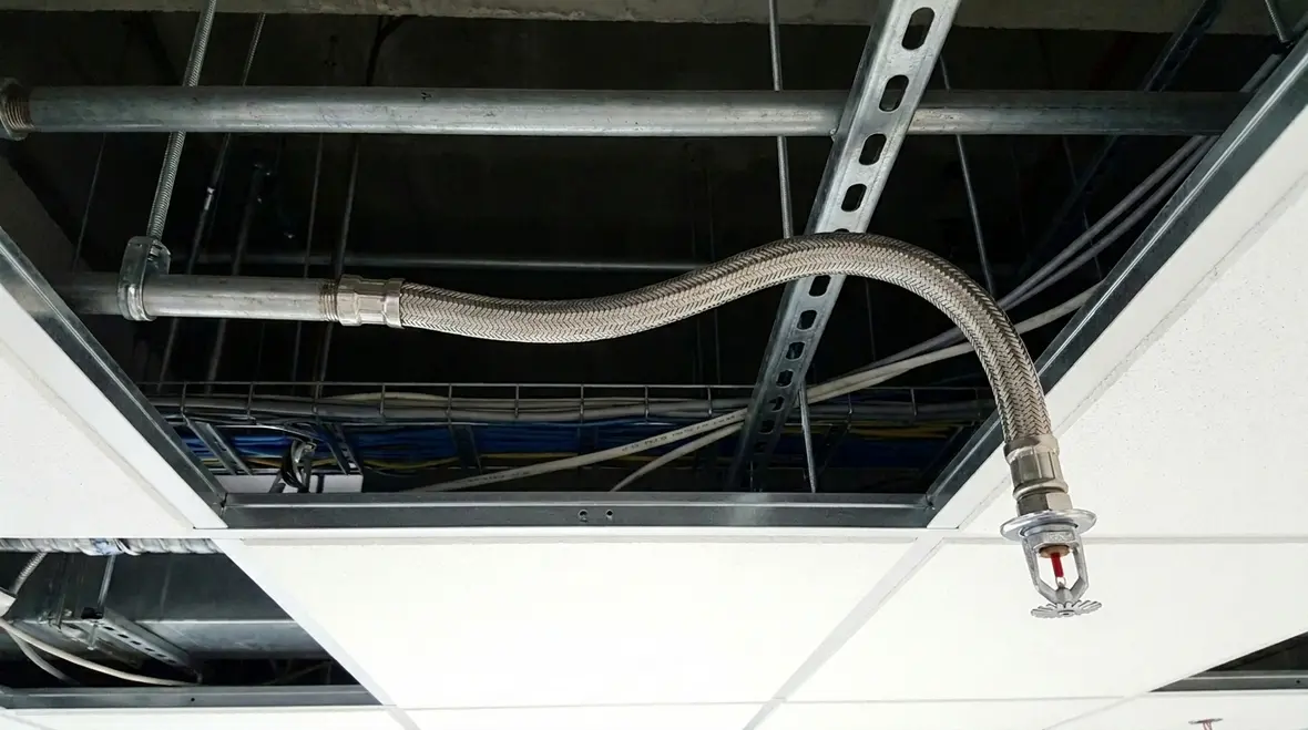 Flexible sprinkler drops in fire systems