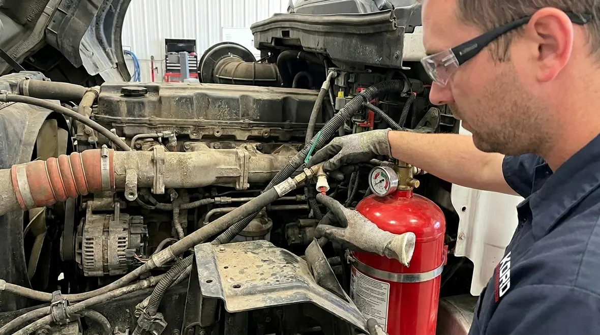Vehicle fire suppression inspection on heavy equipment
