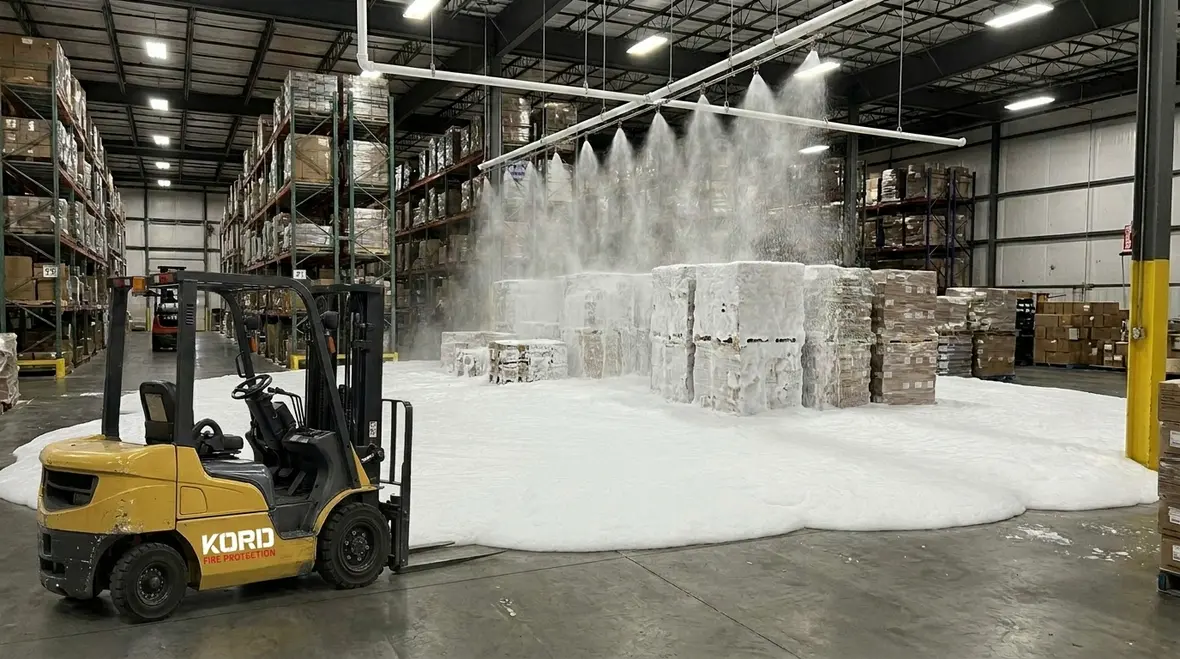 Warehouse foam fire suppression system protecting flammable liquid storage