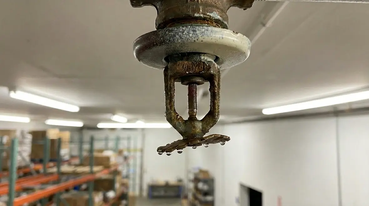 Sprinkler head inspection in a commercial building