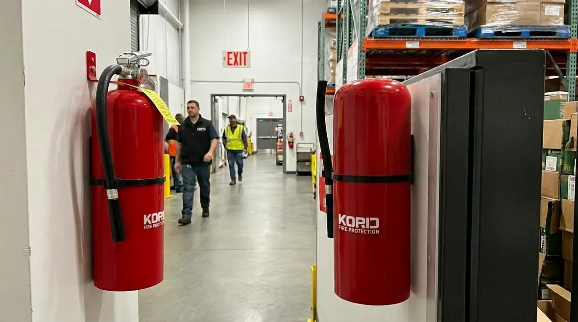 Commercial fire extinguisher placement strategy in a commercial facility