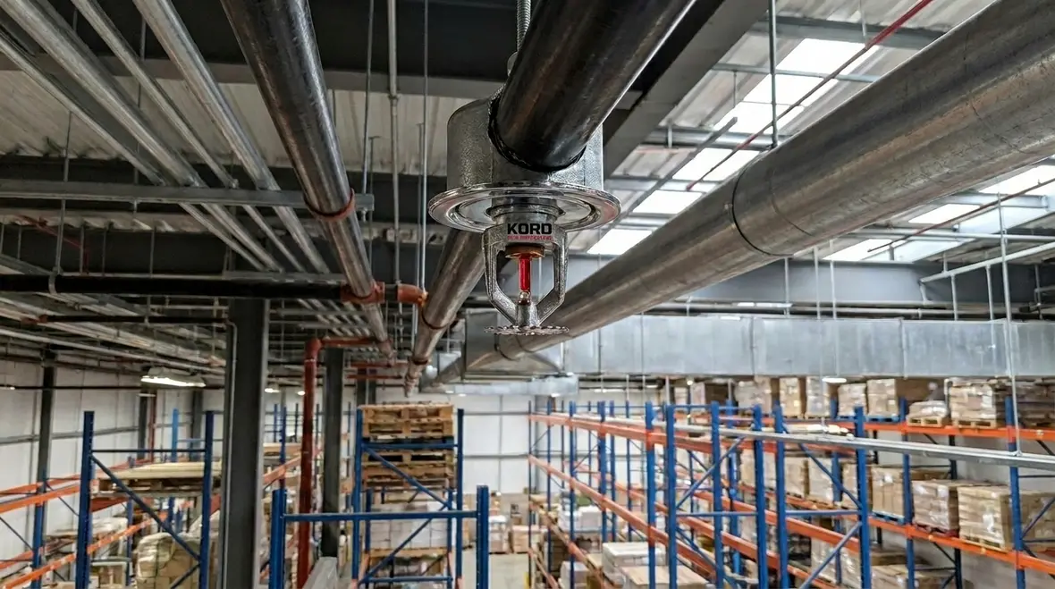 Commercial sprinkler head selection for specialty spaces