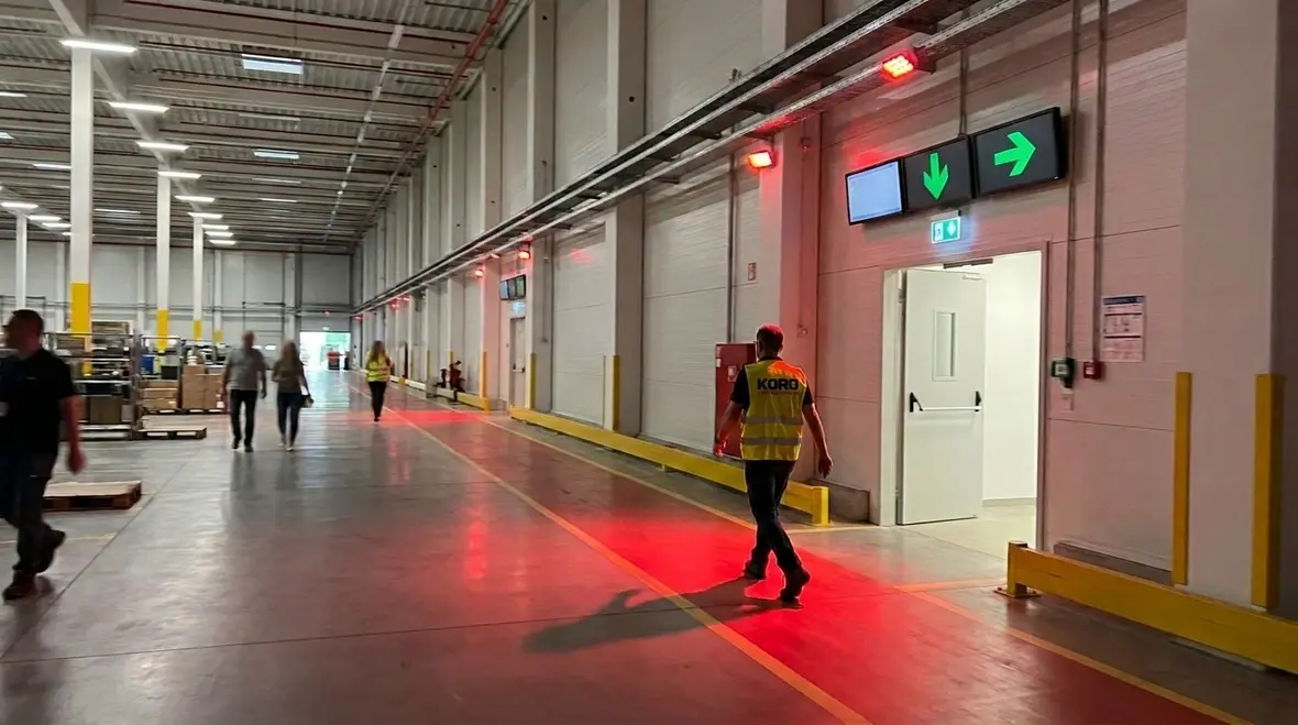 Integrating fire alarms and lighting for safer evacuation