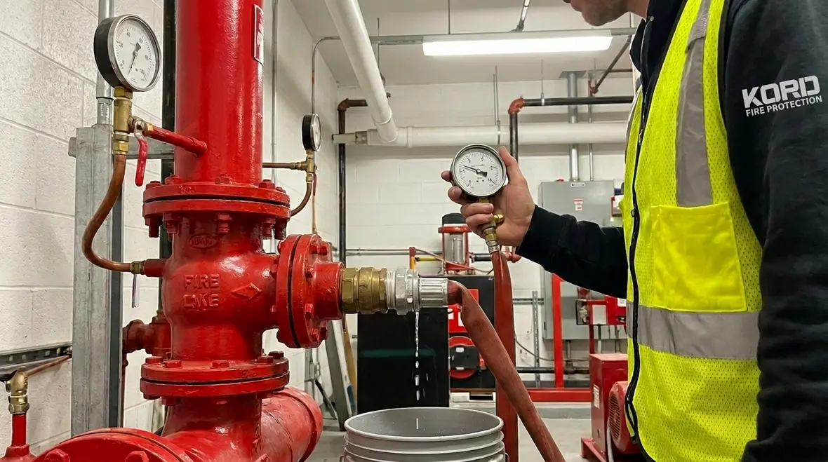 Standpipe system pressure testing in a commercial building