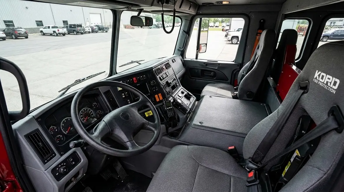 Fire truck cab designed for NFPA 1900 driving compartment safety