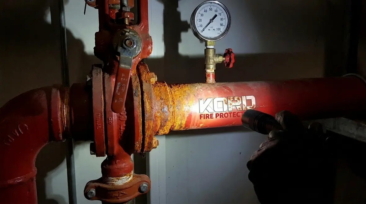 Sprinkler corrosion inhibiting system inside a commercial fire protection network