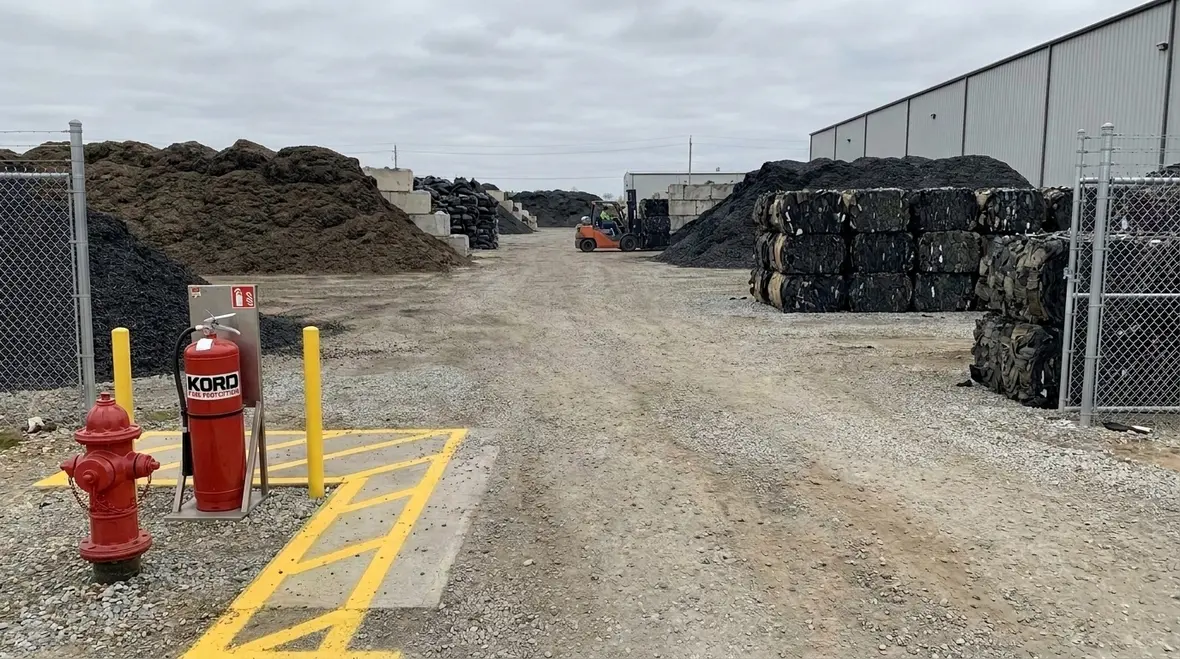Altered tire material storage area showing processed tire material managed for fire safety compliance