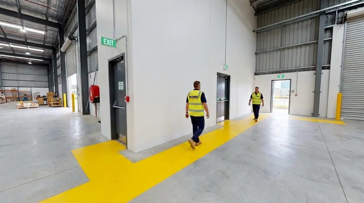 NFPA 1 Section 14.4 means of egress reliability and redundancy in a commercial facility