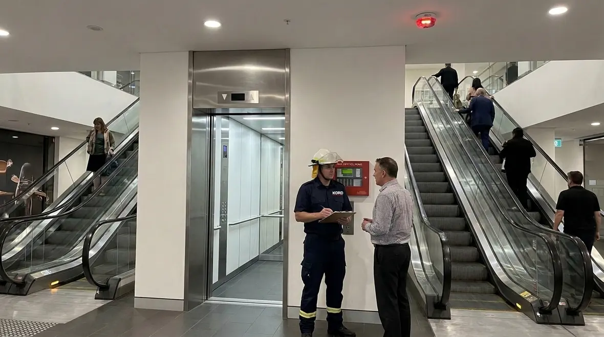 Elevator and escalator fire safety in a commercial building