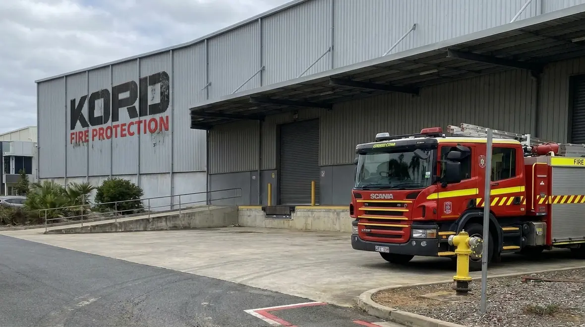Fire access road layout for emergency vehicle entry at a commercial facility