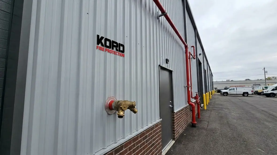 NFPA 1 Section 10.11 fire protection building markings on commercial property