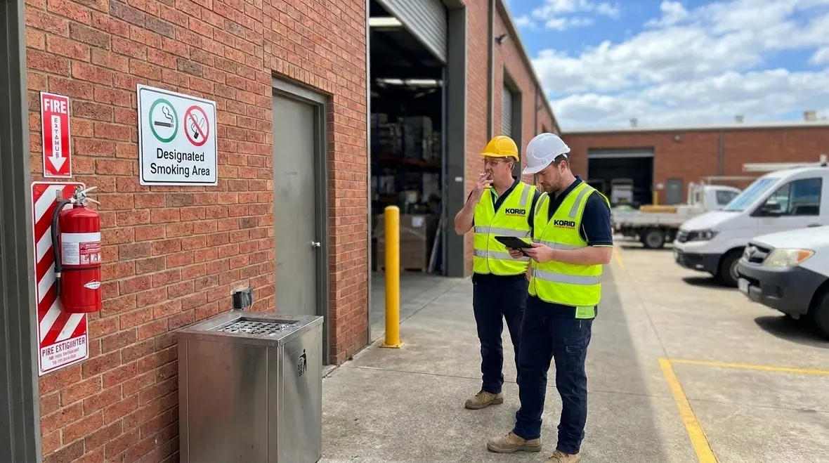 Smoking regulations and fire code safety signage in a commercial facility