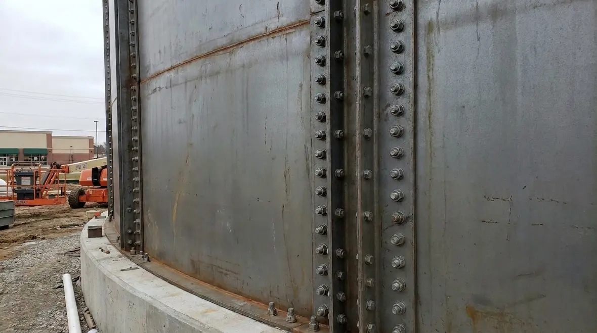 Materials, fabrication, and installation of bolted steel water tanks