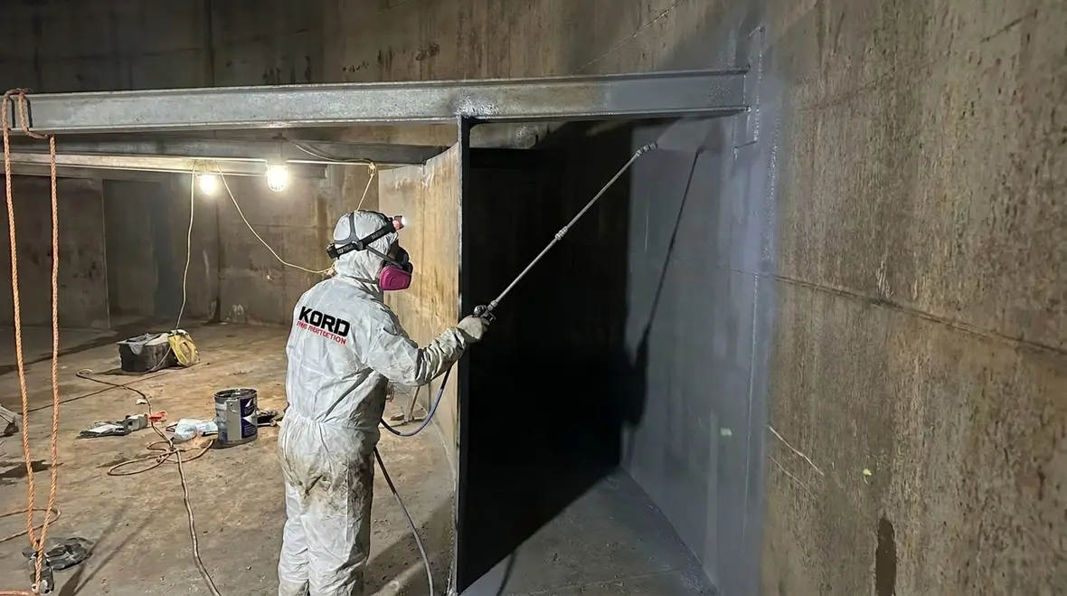 Painting inaccessible areas of a fire protection water tank